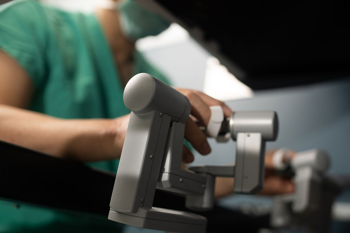 ahlm-john-lee-using-robotic-equipment.jpg