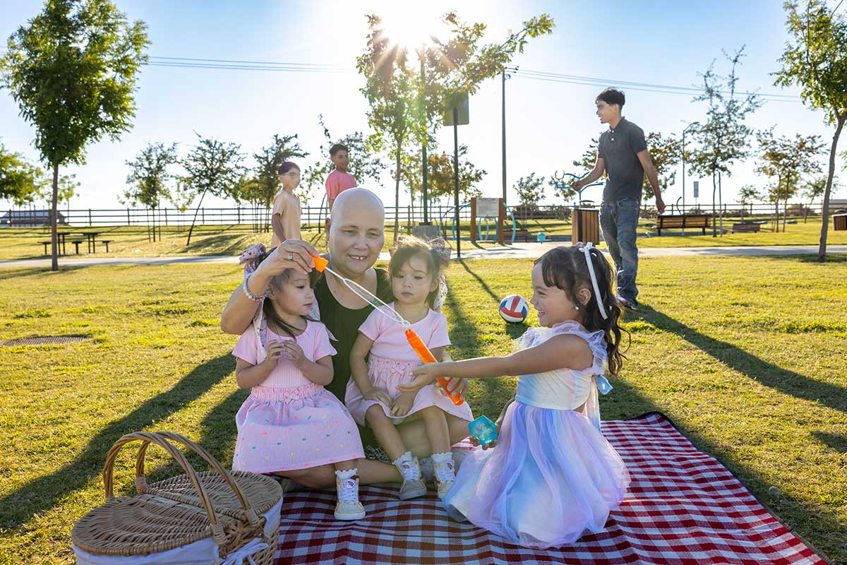 ccn-joni-with-grandchildren.jpg